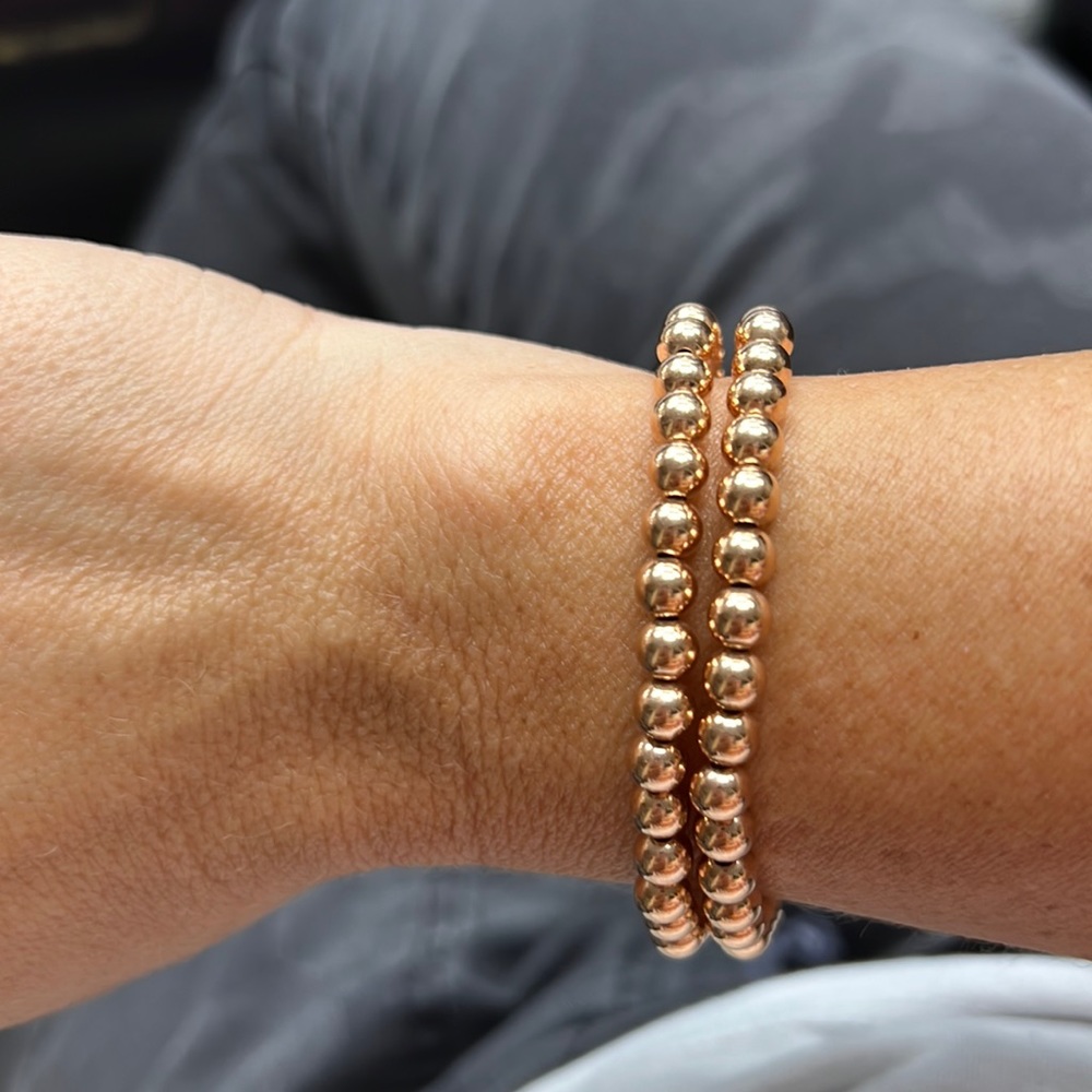 Rose gold bead 6mm bead stretch bracelet.